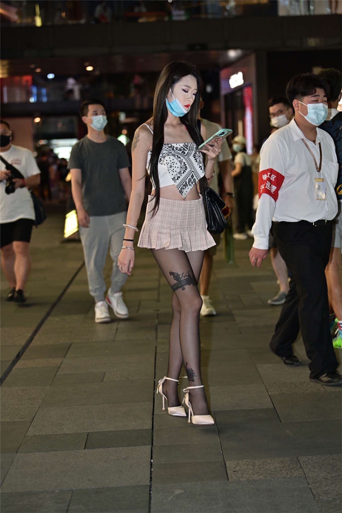 花色短裙纹身美背黑丝美腿