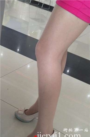 街拍美腿高跟鞋包臀裙性感美女。